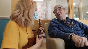 Glasgow care home Colleague entertains Residents with ukulele